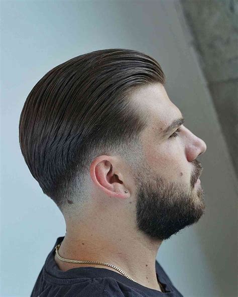 mid fade slick back|slick back with low fade.